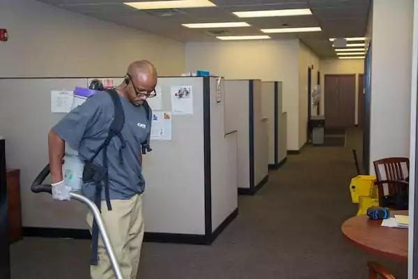 Man cleaning an office